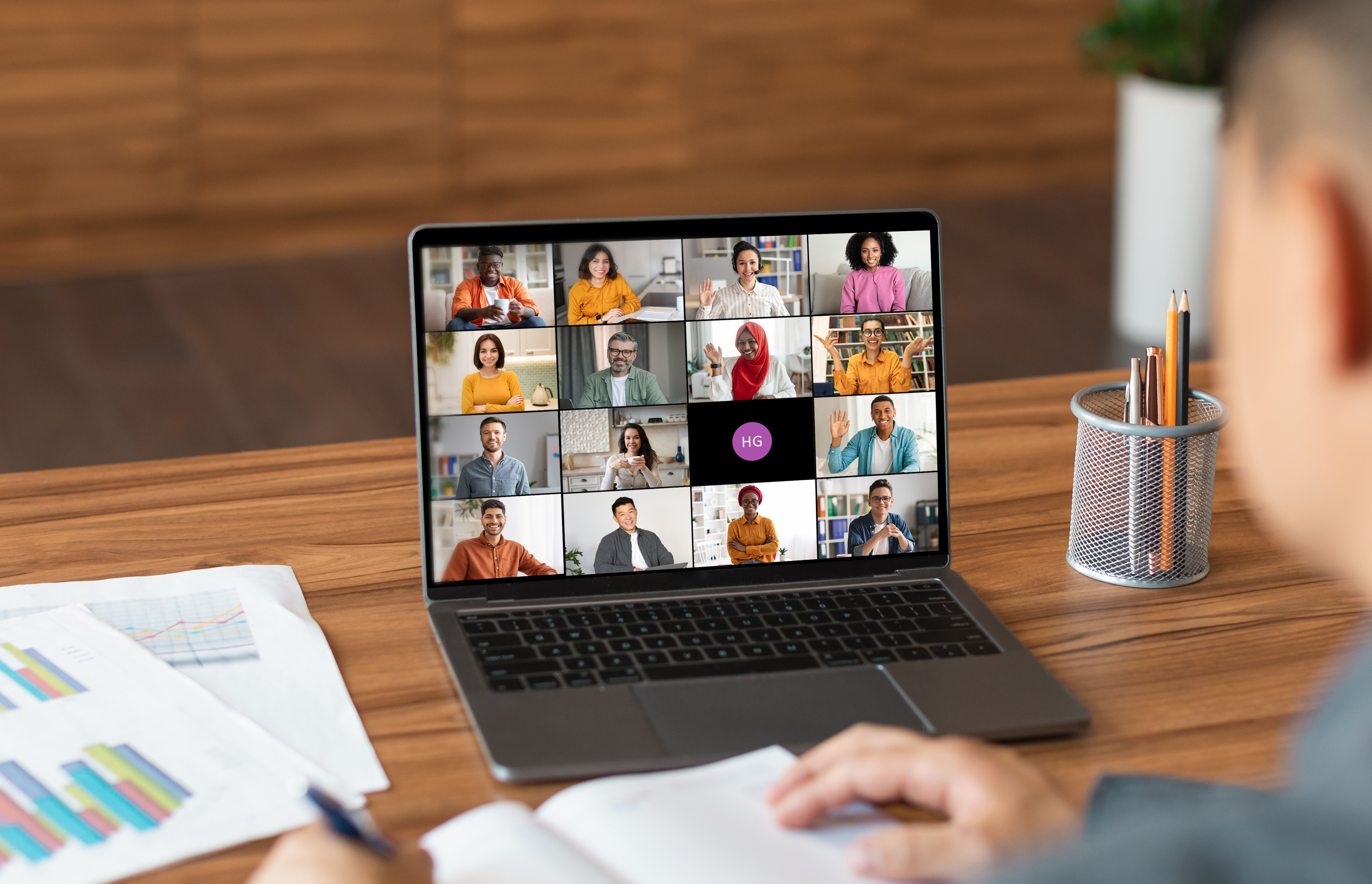 A Man Attends A Video Conference Meeting On Laptop